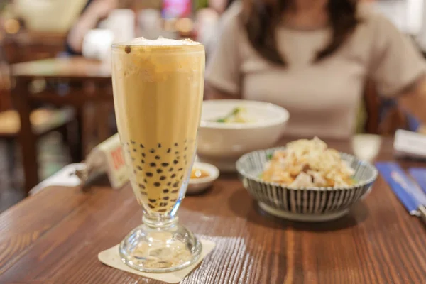 Pearl milk tea with tapioca ball, famous Taiwanese bubble tea of Taiwan. Street Food and travel in Taipei concept