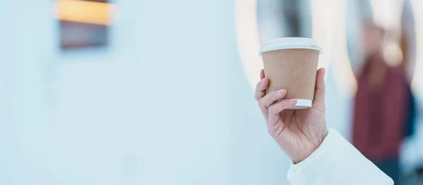 stock image woman tourist holding hot Coffee or Tea paper cup with snow in winter season during travel in Niseko. landmark and popular for attractions in Hokkaido, Japan. Travel and Vacation concepts