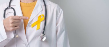 Yellow September, Suicide prevention day, Childhood, Sarcoma, bone and bladder cancer Awareness month, Yellow Ribbon for supporting people life and illness. Healthcare and World cancer day concept