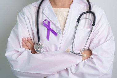 purple Ribbon for Violence, Pancreatic, Esophageal, Testicular cancer, Alzheimer, epilepsy, lupus, Sarcoidosis and Fibromyalgia. Awareness month and World cancer day concept