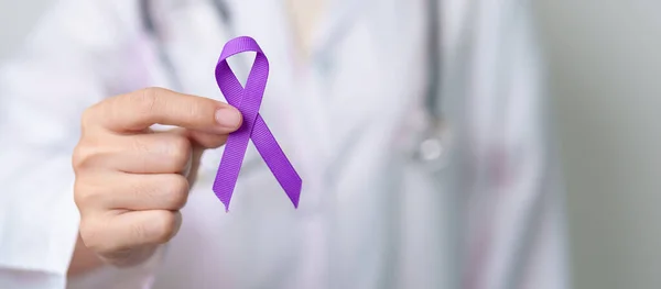 stock image purple Ribbon for Violence, Pancreatic, Esophageal, Testicular cancer, Alzheimer, epilepsy, lupus, Sarcoidosis and Fibromyalgia. Awareness month and World cancer day concept