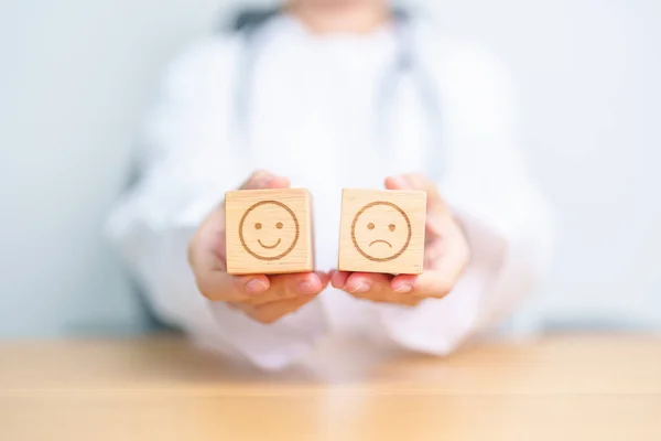 Doctor show Happy smile and Unhappy Sad face block, Mental health Assessment, Psychology, Health Wellness, Feedback, Customer Review, Experience, Satisfaction Survey, World Mental Health day concept
