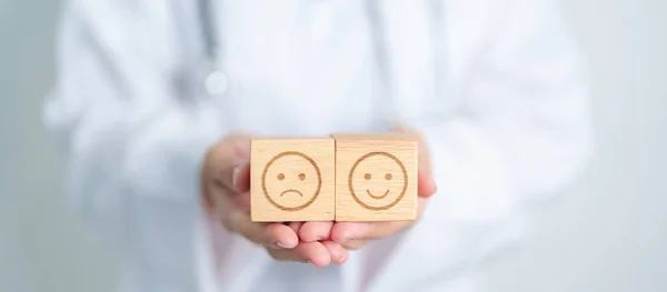 Doctor show Happy smile and Unhappy Sad face block, Mental health Assessment, Psychology, Health Wellness, Feedback, Customer Review, Experience, Satisfaction Survey, World Mental Health day concept