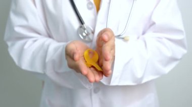 Yellow September, Suicide prevention day, Childhood, Sarcoma, bone and bladder cancer Awareness month, Yellow Ribbon for supporting people life and illness. Healthcare and World cancer day concept