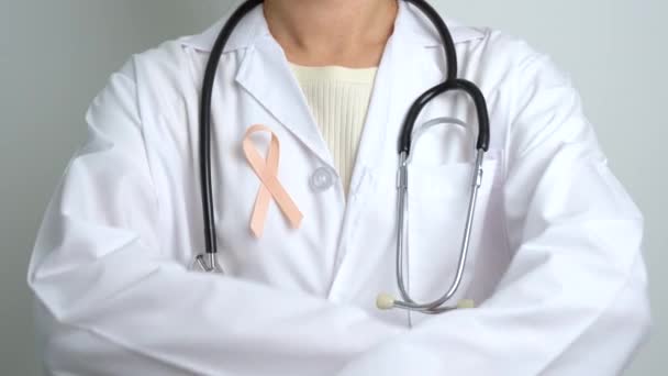 Fita Pêssego Para Mês Conscientização Câncer Uterino Setembro Cuidados Saúde — Vídeo de Stock