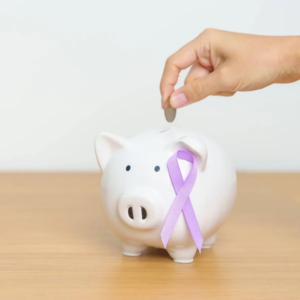 World cancer day, February 4, Lavender purple with Piggy Bank for support illness life. Health, Donation, Charity, Campaign, Money Saving, Fund, All cancer and medical concept