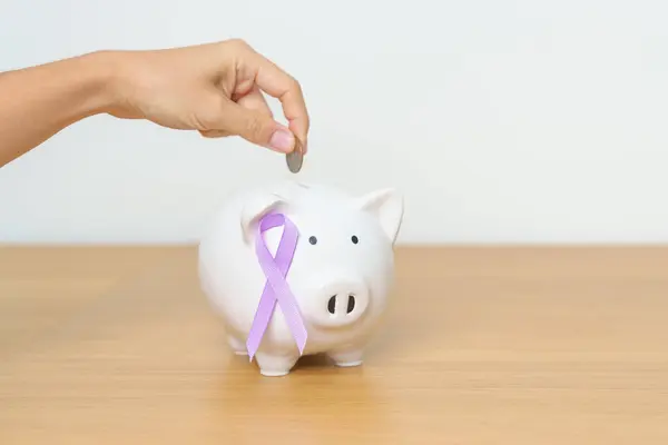 World cancer day, February 4, Lavender purple with Piggy Bank for support illness life. Health, Donation, Charity, Campaign, Money Saving, Fund, All cancer and medical concept