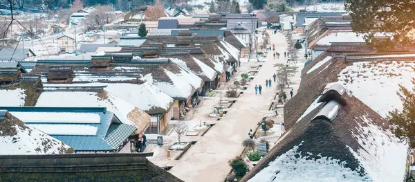 Stock image Ouchi Juku ancient farmer house village with snow in winter, former post town along the Aizu-Nishi Kaido trade route during the Edo Period. Shimogo town, Minamiaizu, Fukushima Prefecture, Japan