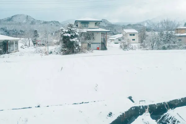 stock image Landscape of mountain with snow in winter day. Photo from train window. Nature background