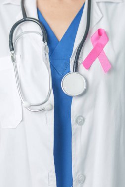 Pembe Ekim Göğüs Kanseri Bilinci Ayı, Pembe Kurdeleli kadın doktor, insanların hayatını ve hastalıklarını desteklemek için hastanede. Ulusal Kanserden kurtulanlar ayı, Anne ve Dünya Kanser Günü konsepti