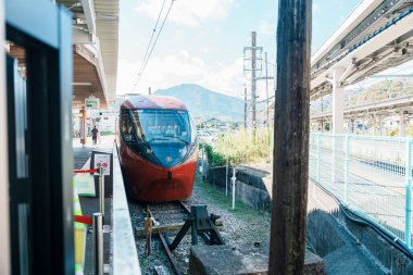 FUJISAN VIEW EXPRESS train at at Otsuki station, a railway station on the Chuo Main Line in the city of Otsuki, operated by JR East and Fuji Kyuko. Yamanashi, Japan, 15 November 2023 clipart