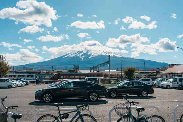 stock image Kawaguchiko Station with Mount Fuji behind, is a railway station on the Fujikyuko Line in Fujikawaguchiko, Yamanashi, Japan, operated by Fuji Kyuko (Fujikyu). Yamanashi, Japan, 15 November 2023