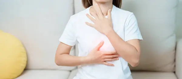 stock image Gastroesophageal Reflux Disease or GERD, Acid reflux disease, Gastro Oesophageal or GORD and Dyspepsia concept. woman having Stomach ache and Esophageal pain due to Digestion system problem