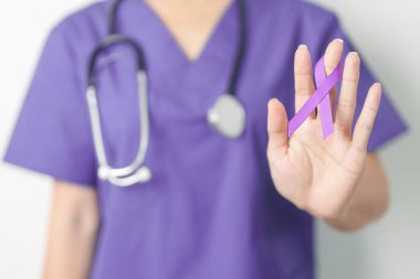 Doctor holding purple Ribbon for Violence, Pancreatic, Esophageal, Testicular cancer, Alzheimer, epilepsy, lupus, Sarcoidosis and Fibromyalgia. Awareness month and World cancer day concept clipart