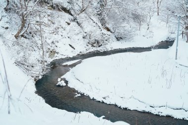 Kış mevsiminde kar yağan Ginzan Onsen köyünün güzel manzarası Japonya 'nın Yamagata kentindeki en ünlü Japon Baharıdır..