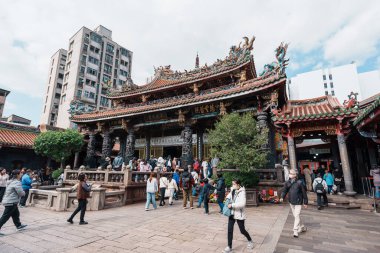 Longshan Temple, Chinese folk religious temple in Wanhua District, Taipei City. landmark and popular for tourists attractions. Taipei, Taiwan, 12 January 2025 clipart