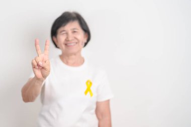 Sarı Kurdeleli Yaşlılar sarı Eylül, İntihar Önleme Günü, Çocukluk, Temmuz Sarkoması, çocuk aylarında kemik kanseri bilinci, hayatta kalanları destekliyor. Sağlık ve Dünya Kanser Günü