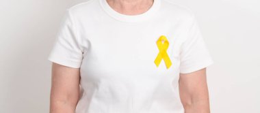 Sarı Kurdeleli Yaşlılar, İntihar Önleme Günü, Çocukluk, Temmuz Sarkoması, Ekim Spina Bifida farkındalık ayı konsepti, hayatta kalanlara destek. Sağlık ve Dünya Kanser Günü