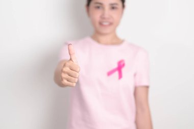 Pembe Ekim Göğüs Kanseri Farkındalığı Ayı, insanların yaşam ve hastalıklarını desteklemek için pembe kurdeleli kadın. Ulusal Kanserden kurtulanlar Ayı, Kadın Sağlığı Günü ve Şubat Dünya Kanser Günü