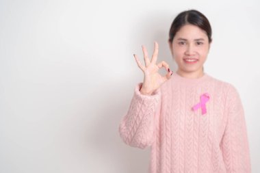 Pembe Ekim Göğüs Kanseri Farkındalığı Ayı, insanların yaşam ve hastalıklarını desteklemek için pembe kurdeleli kadın. Ulusal Kanserden kurtulanlar Ayı, Kadın Sağlığı Günü ve Şubat Dünya Kanser Günü