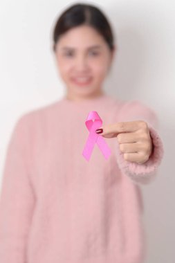 Pembe Ekim Göğüs Kanseri Farkındalığı Ayı, insanların yaşam ve hastalıklarını desteklemek için pembe kurdeleli kadın. Ulusal Kanserden kurtulanlar Ayı, Kadın Sağlığı Günü ve Şubat Dünya Kanser Günü