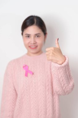 Pembe Ekim Göğüs Kanseri Farkındalığı Ayı, insanların yaşam ve hastalıklarını desteklemek için pembe kurdeleli kadın. Ulusal Kanserden kurtulanlar Ayı, Kadın Sağlığı Günü ve Şubat Dünya Kanser Günü