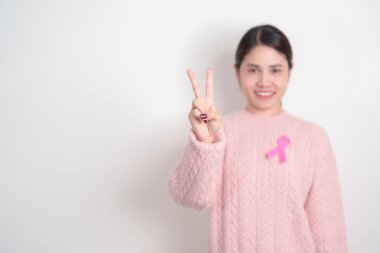 Pembe Ekim Göğüs Kanseri Farkındalığı Ayı, insanların yaşam ve hastalıklarını desteklemek için pembe kurdeleli kadın. Ulusal Kanserden kurtulanlar Ayı, Kadın Sağlığı Günü ve Şubat Dünya Kanser Günü