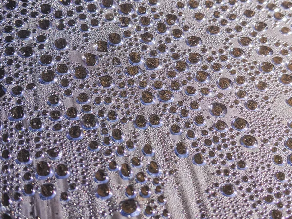 stock image Water drops on white background texture. backdrop glass covered with drops of water. bubbles in water