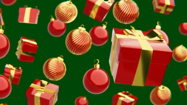 緑の背景の前で回転するクリスマスギフトボックスや装飾品 鮮やかなクリスマスのテーマの古典的な色で — ストック動画