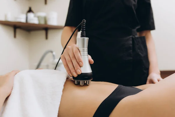 Cosmetologist. Lymphatic drainage massage LPG apparatus process. Woman getting massage in a beauty SPA salon. LPG, and body contouring treatment in clinic