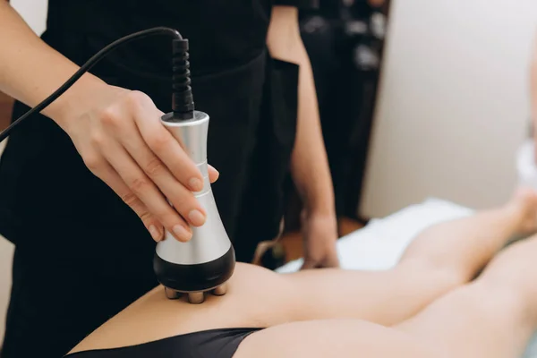 Cosmetologist. Lymphatic drainage massage LPG apparatus process. Woman getting massage in a beauty SPA salon. LPG, and body contouring treatment in clinic