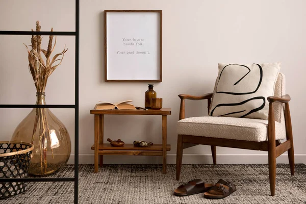 Creative composition of living room interior with mock up poster frame, boucle armchair, patterned pillow, bench, beige wall, glass vase with dried flowers and personal accessories. Home decor. Template.