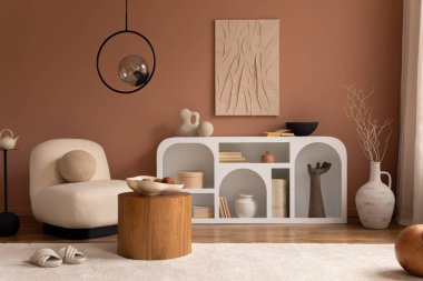 Interior design of living room interior with mock up poster frame, modern commode, round coffee table, beige bowl, beige carpet, slippers, sculture and personal accessories. Home decor. Template. 