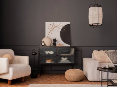 Creative composition of living room interior with mock up poster frame, glass sideboard, vase with dried flowers, modular sofa, wooden floor, dark wall and personal accessories. Home decor. Template.