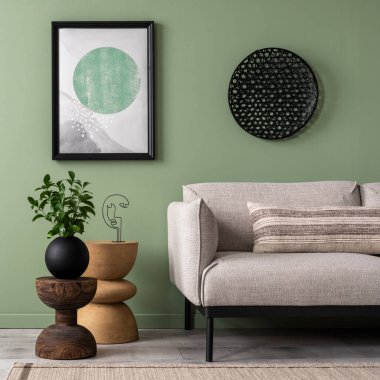 The stylish composition at living room interior with mock up and copy space, design gray sofa, coffee table and elegant personal accessories. Template.