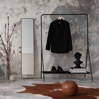 The stylish compostion at living room interior with design gray sofa, bench, coffee table, hanger, lamp and elegant personal accessories. Loft and industrial interior. Mock up poster. Template.