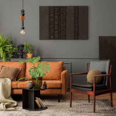 Cozy living room interior with mock up poster frame, brown sofa, leather armchair, black coffee table, books, plants in flowerpots. gray carpet, pillows and personal accessories. Home decor. Template.