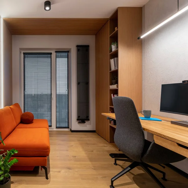 Creative Composition Office Interior Stylish Orange Sofa Wooden Desk Simple — 스톡 사진