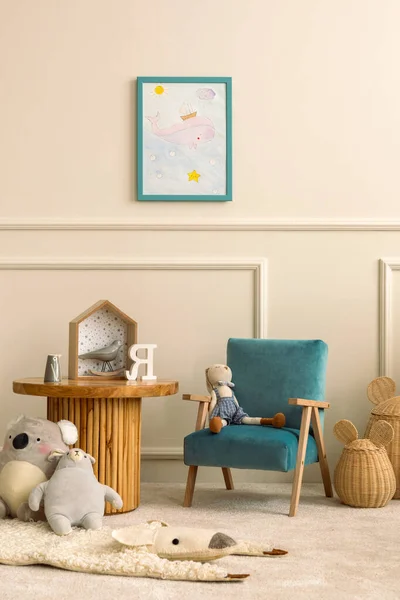 stock image Interior design of kids room with mock up poster frame, round wooden table, blue armchair, plush toys, animal rug, wooden blockers, wicker basket and personal accessories. Home decor. Template.