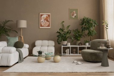 Beyaz kanepesi ve halısı olan modern bir oda.