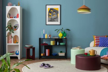 Modern and colorful interior of living room with design boucle sofa, mock up poster, shelf, plants, decorations and personal stuff. Home decor.	
