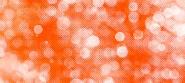 Orange widescreen bokeh background. Simple design backdrop for banners, posters, and various design works
