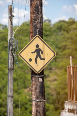 Sign for a place to practice soccer on the street of Sao Luiz do Paratitinga, state of Sao Paulo. Brazil