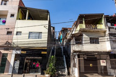 View of favela buildings, poor neighborhood of Osasco. Staircase in the community on the outskirts of the city of Sao Paulo, Brazil clipart