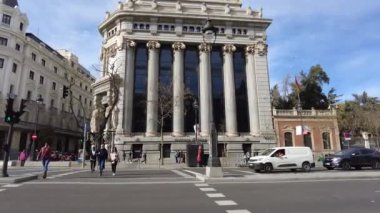Spain, Madrid - March 13, 2023: Walking through the streets of the city. Central Street. People go for a stroll through the sights of the city. Architecture of the old city.