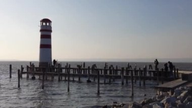 Neusiedl, Podersdorf am See, Burgenland, Austria - 4, March 2023: View of the lighthouse, wooden pier