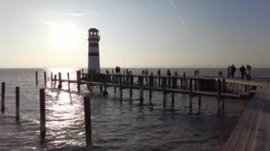 Neusiedl, Podersdorf am See, Burgenland, Austria - 4, March 2023: View of the lighthouse, wooden pier