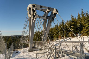 Sky Bridge 721, Lower Moravia, Czech Republic - December 1, 2024: The longest pedestrian suspension bridge in the world. Mountain resort Dolni Morava in the Czech Republic. clipart