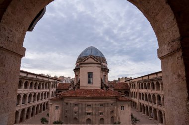 Marseille, France, February 2, 2025: View of the Vielle Charite. A cultural center in a former 17th-century almshouse with a dome. clipart