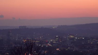 Brno, Czech Republic - March 29, 2025: View of the city from above at night. Evening city panorama. Shpilberk Castle.